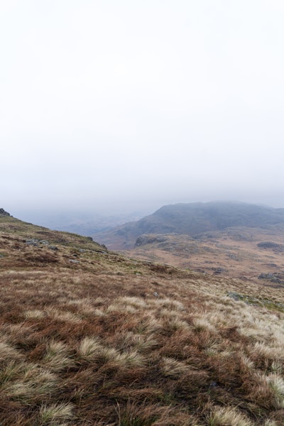 A view down Harter Fell from the peak