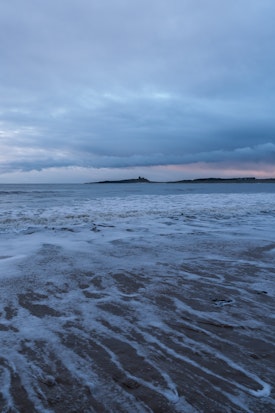 A view back to Dunstanburgh
