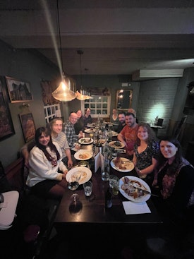 A group round a table at the Sheep Heid Inn