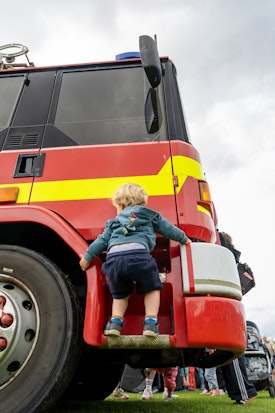 Jack climbing on a fire engine