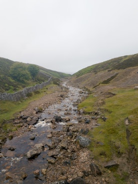 The small river flowing down the hill