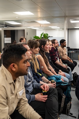 The audience listens to the talks